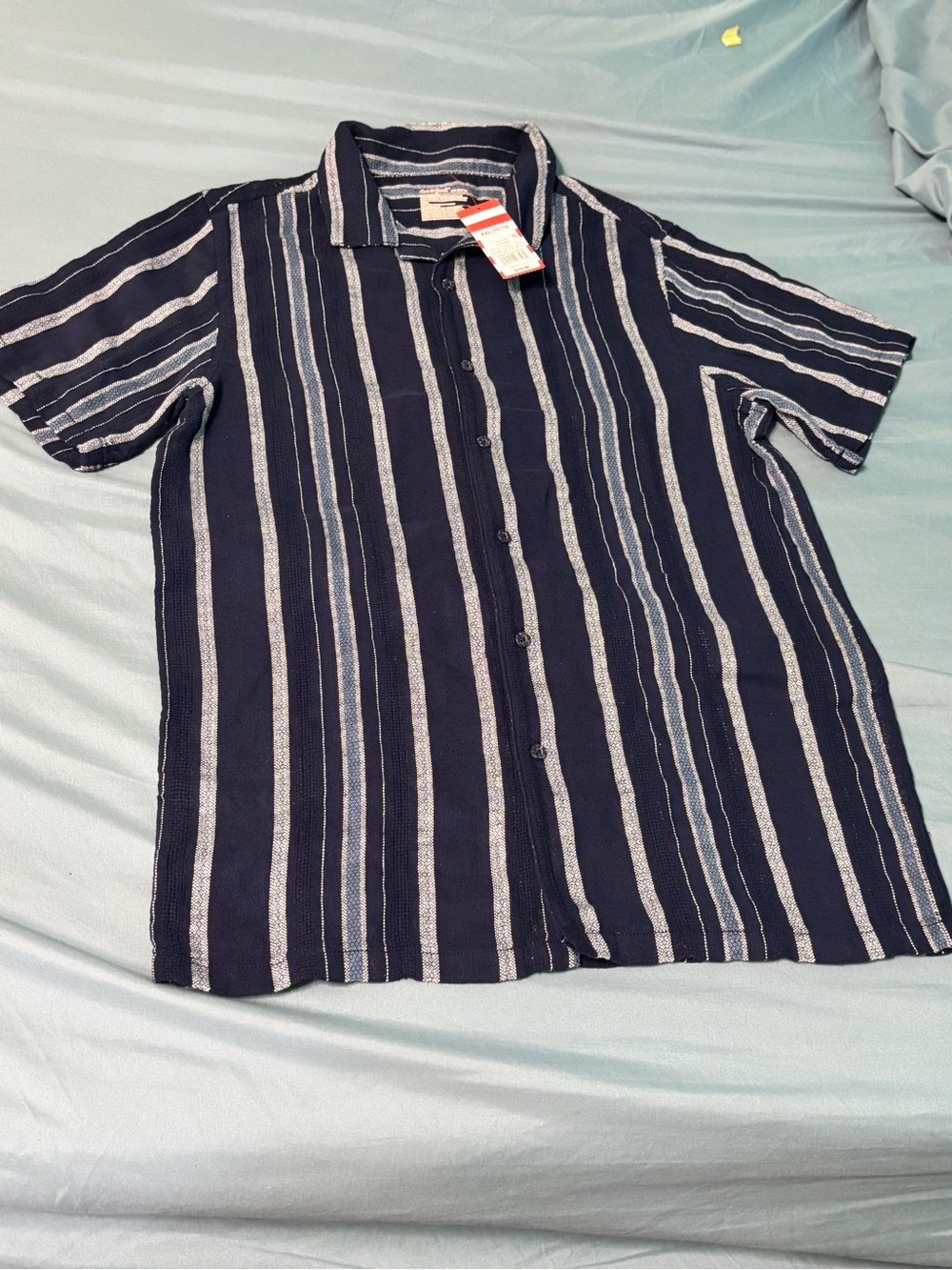 Navy blue and white striped pieces